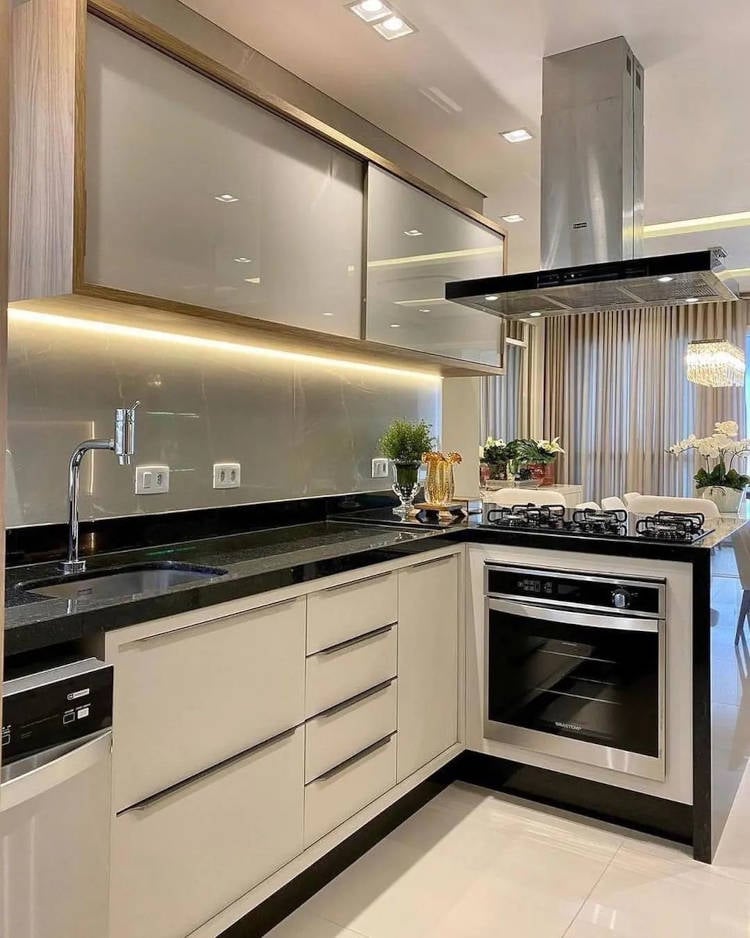 Small planned kitchen with lighting behind the upper cabinet.