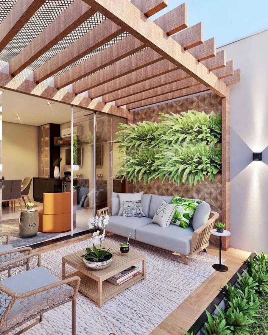 Balcony with pergola and sofa.