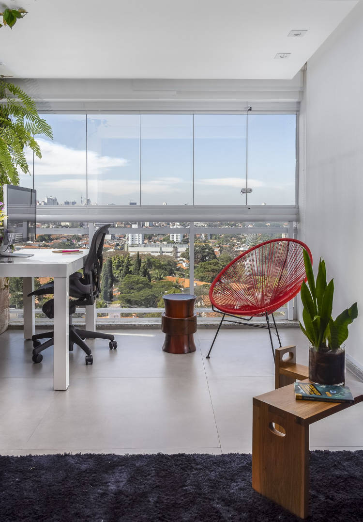 Home office with glass wall.