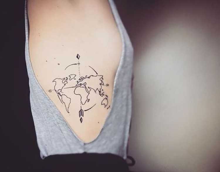 World map tattoo on a woman's rib