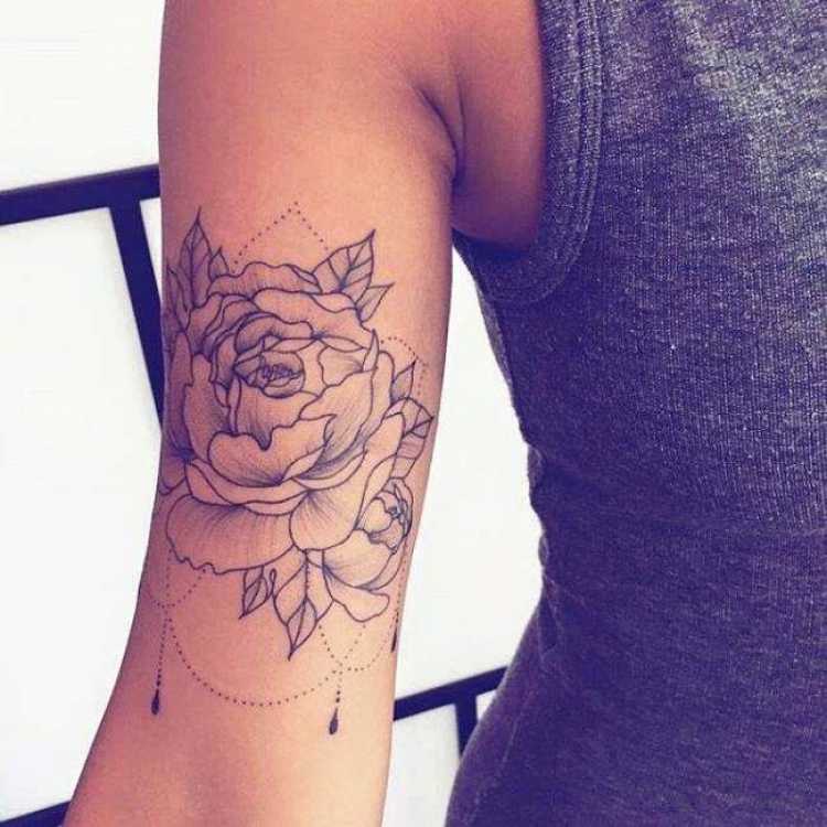 Rose on the arm is one of the most beautiful tattoos for women