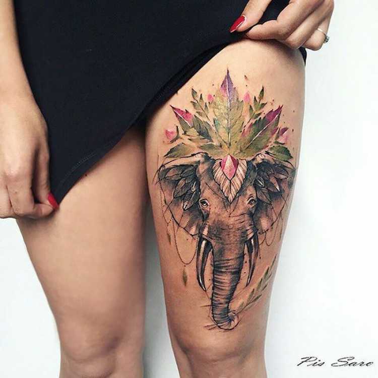 Female thigh tattoo