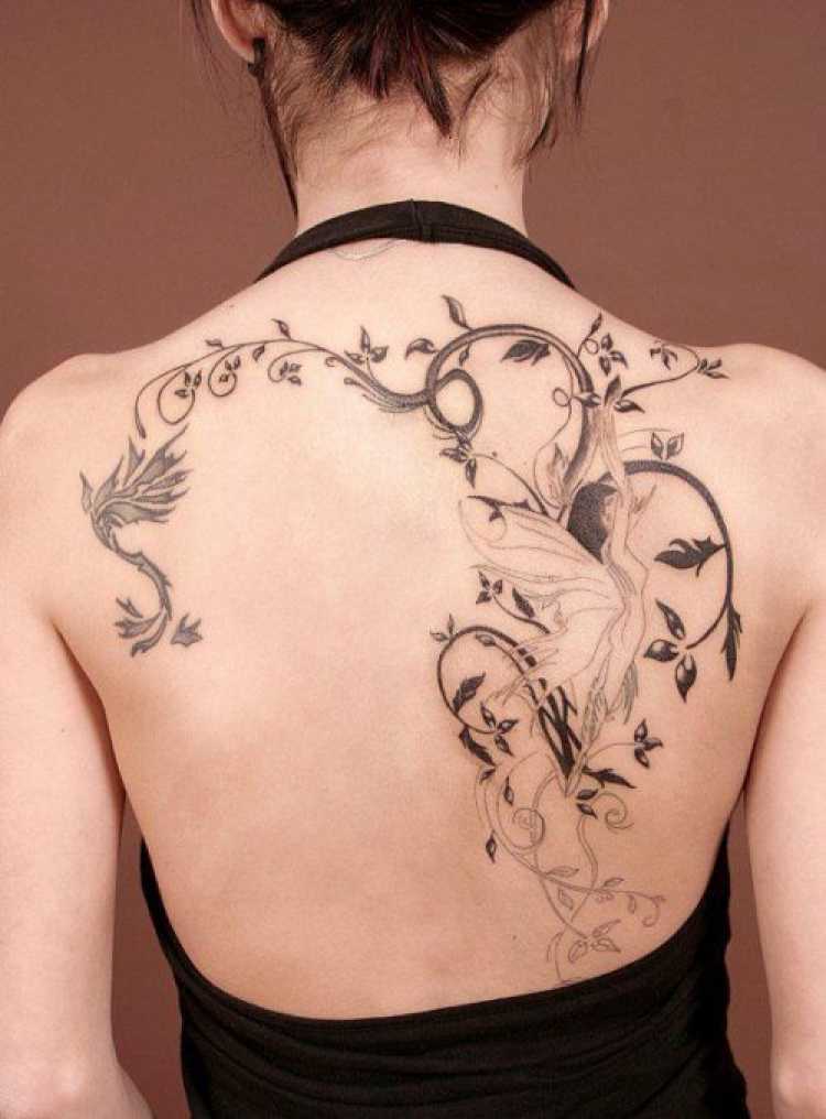 Branches and leaves tattoo on back