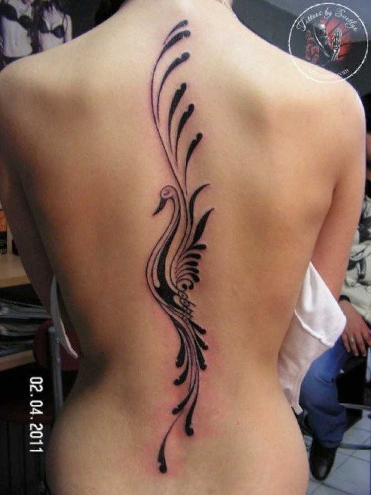 female tattoo on back