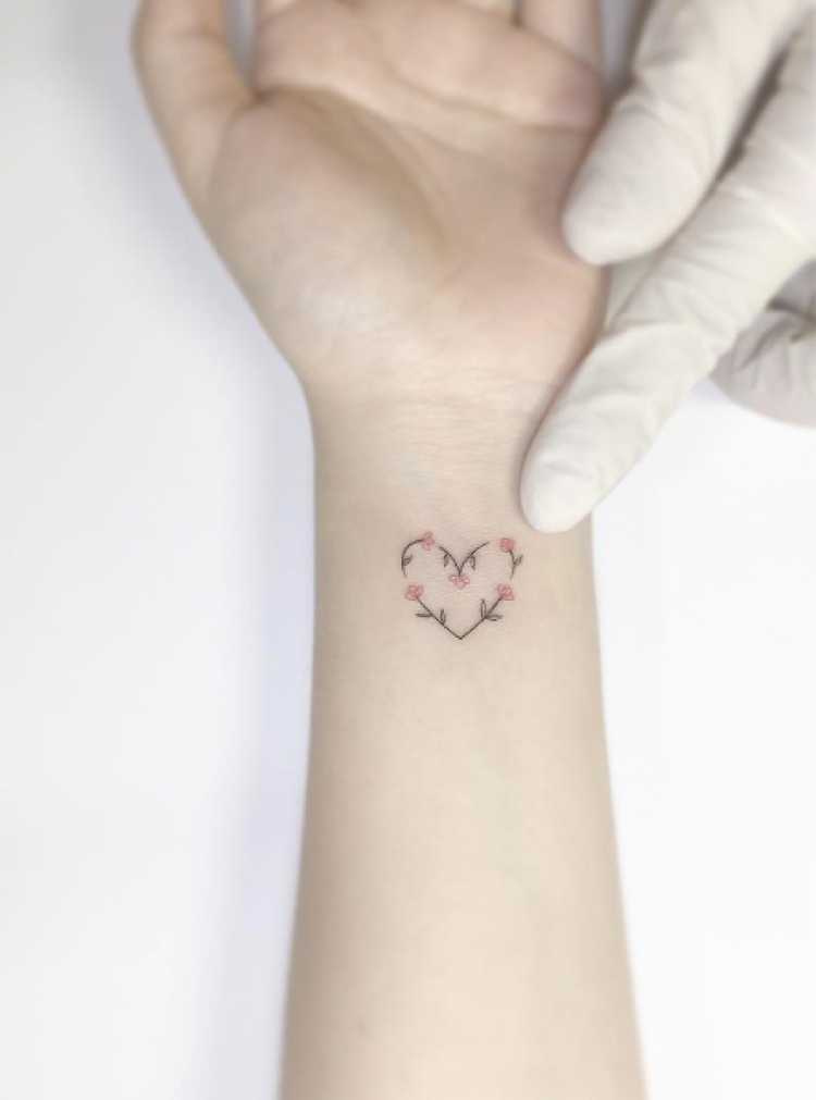 Female heart-shaped tattoo