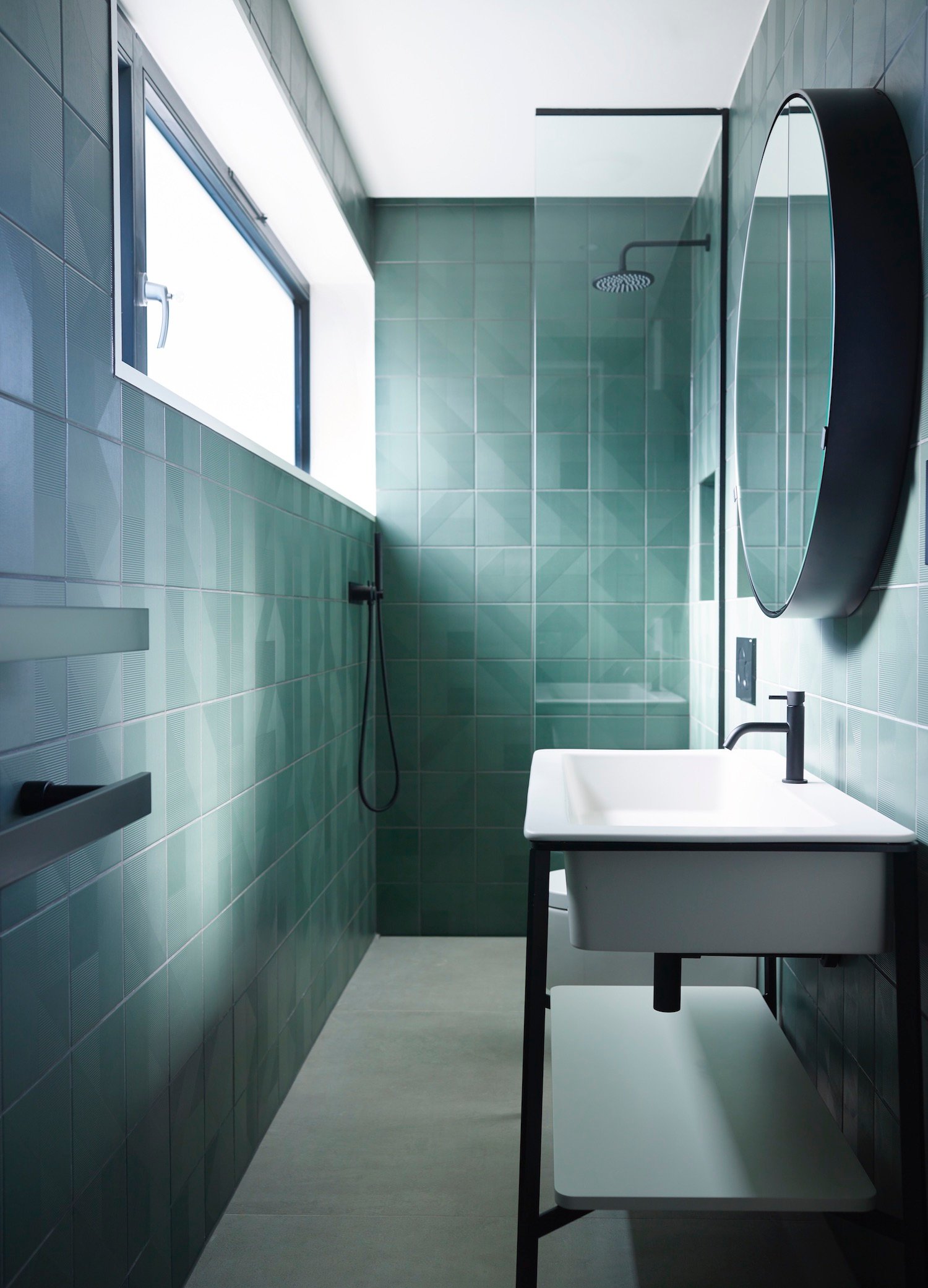 Small bathroom decorated in green