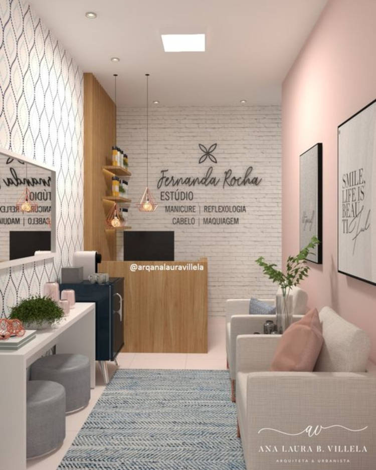 Small beauty salon with pink wall.