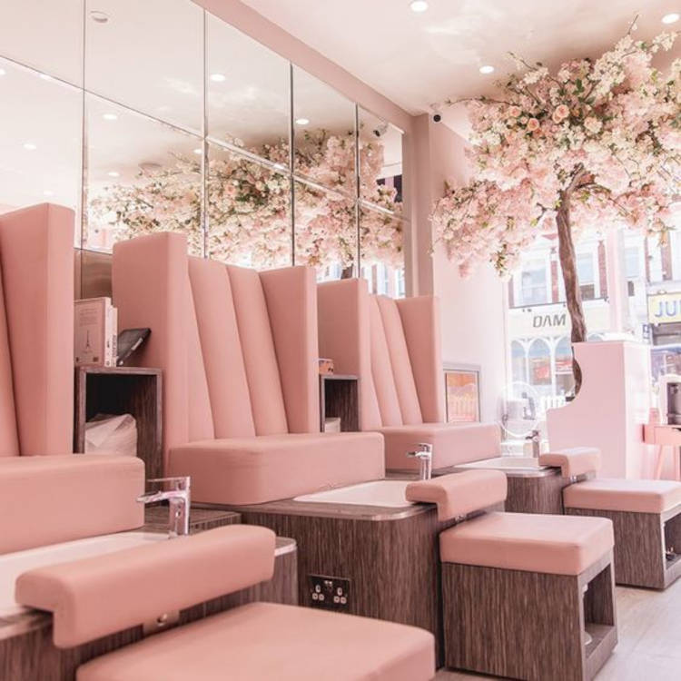 Beauty salon with pink decor.