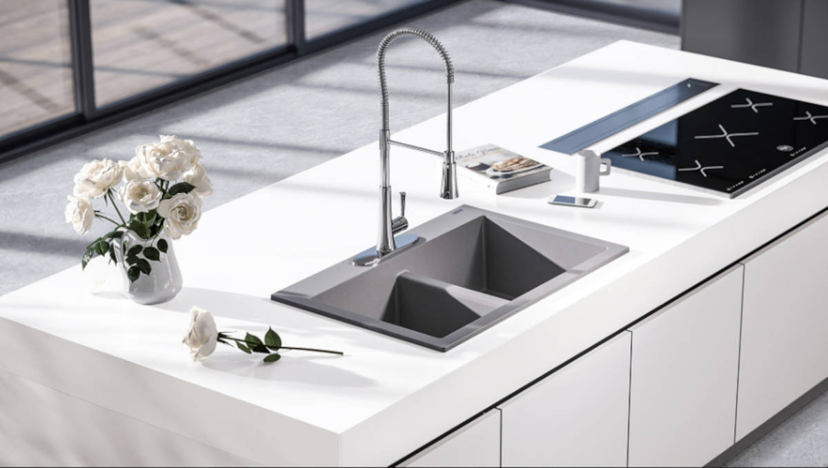 Kitchen countertop with gray sink.