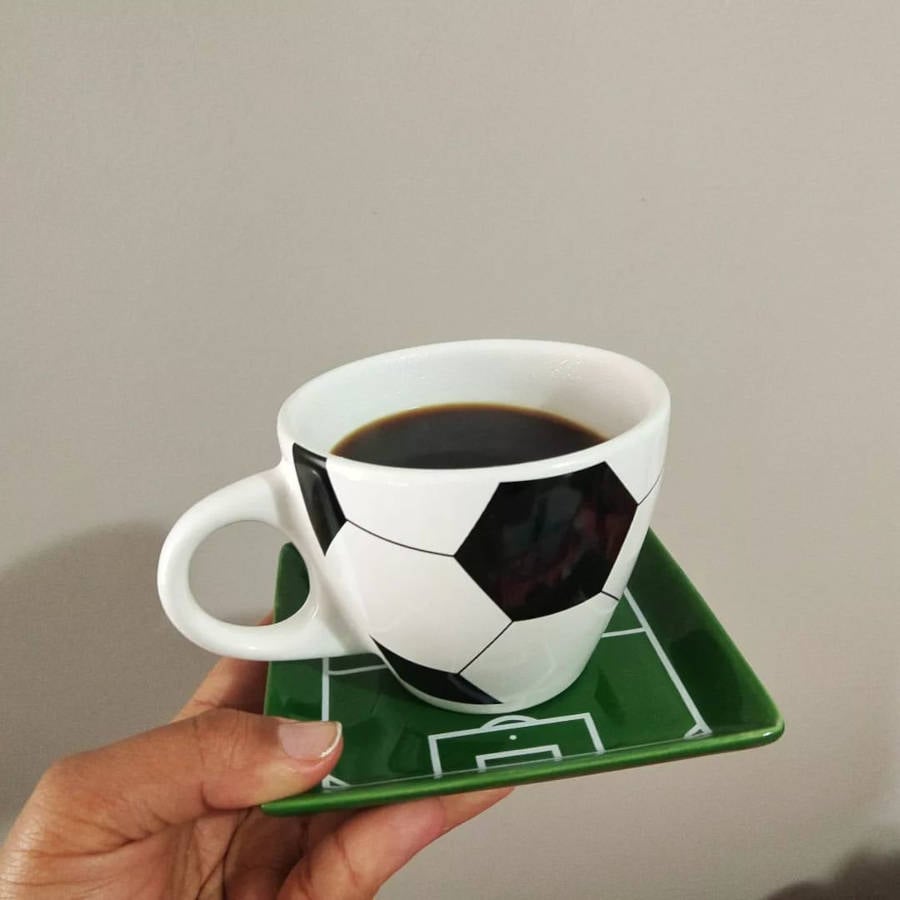 Football themed cup and saucer for World Cup decoration