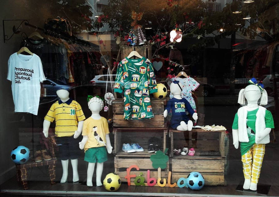 Children's store decorated with soccer balls.