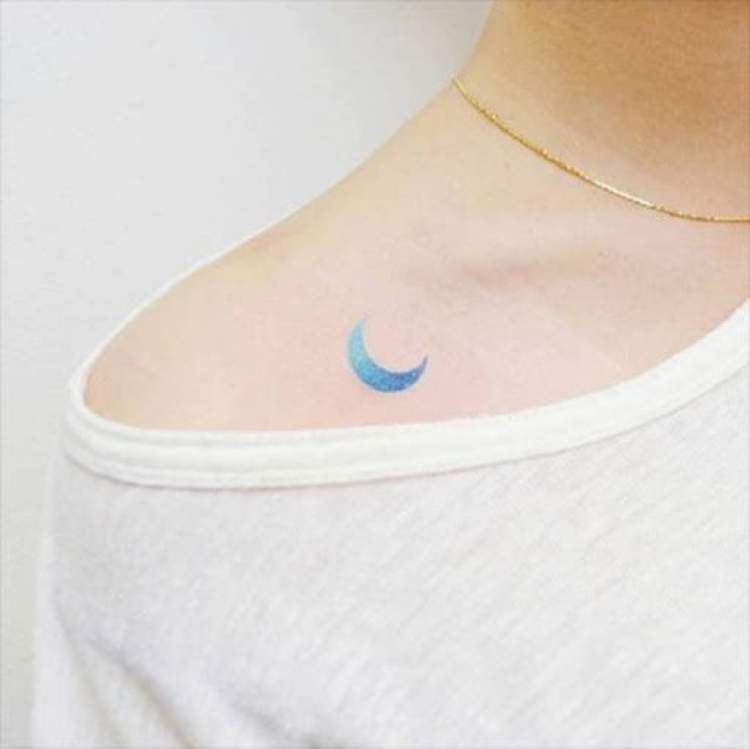 Example of a delicate tattoo with a half moon design