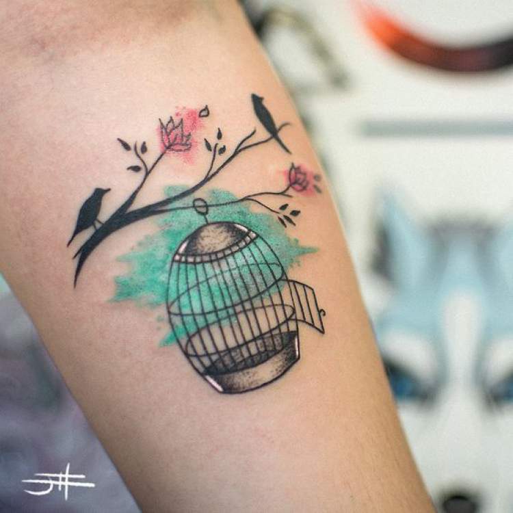 Bird tattoo on arm