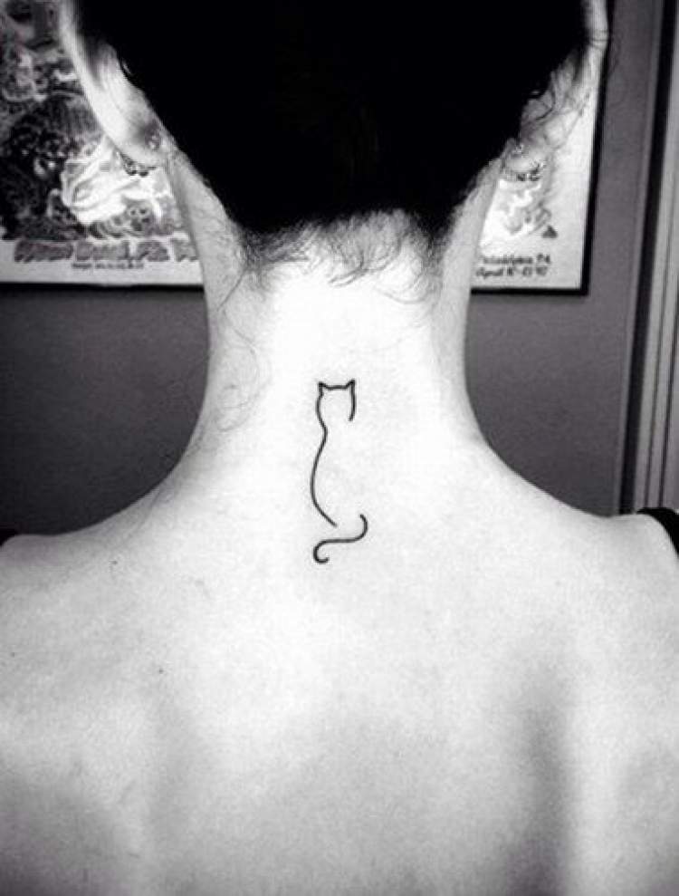 Cat tattoo on the back of the neck