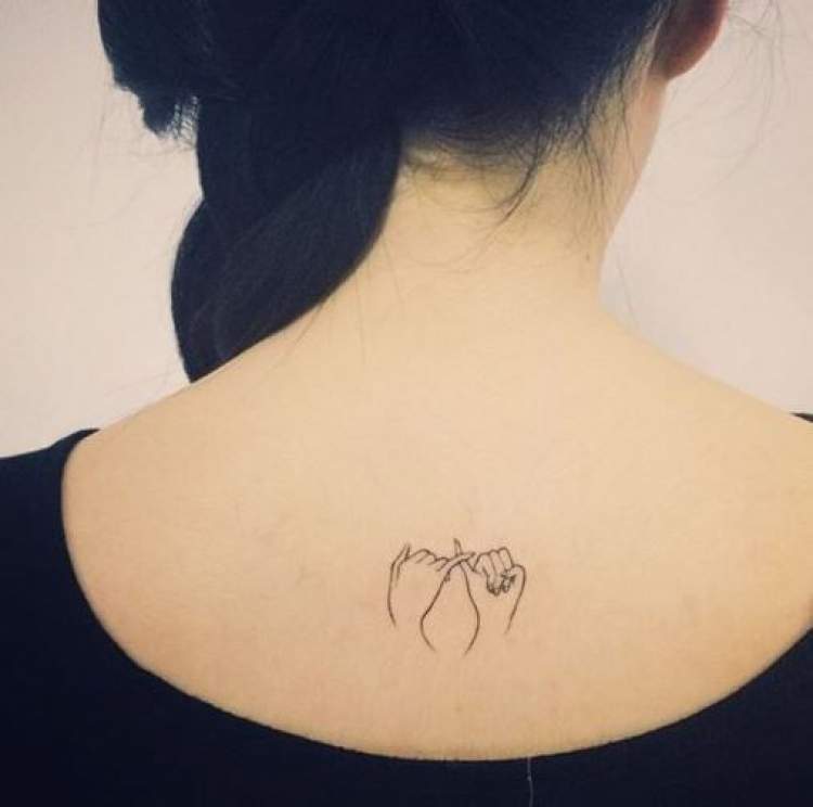 Delicate pact back tattoo