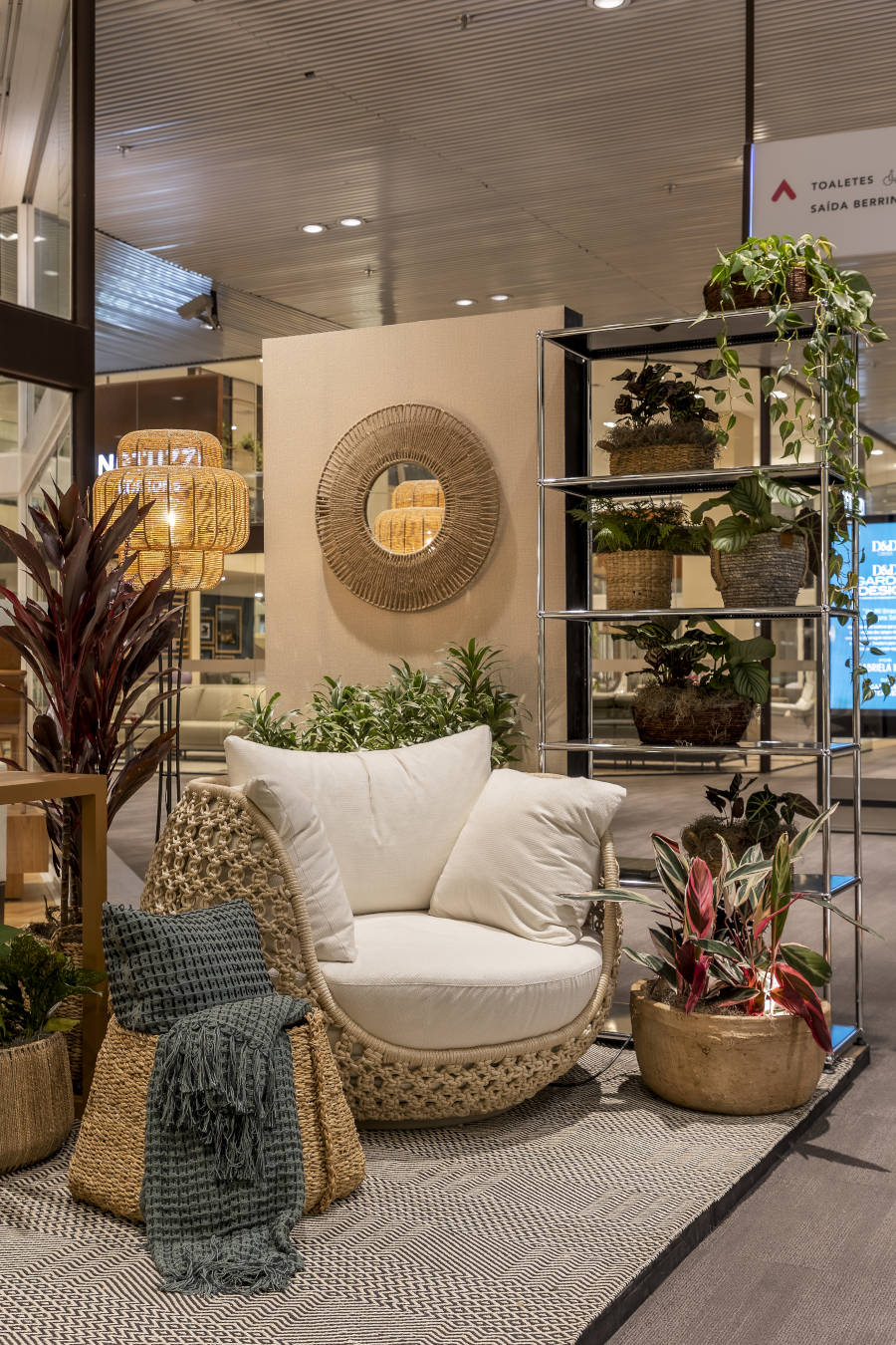 Small garden with plants on shelves.