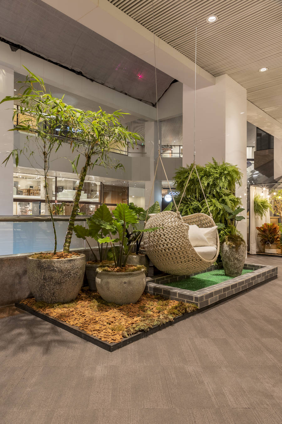 Garden with large cement pots.