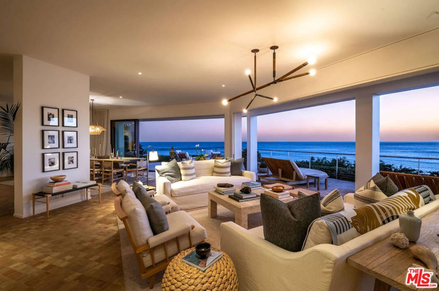 Living room of the mansion with a view of the sunset.