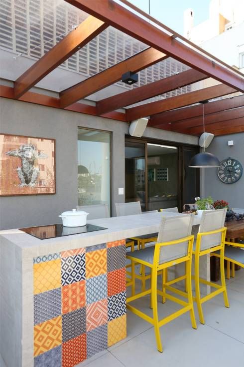 Small gourmet backyard with pergola