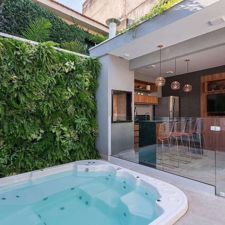 Small gourmet backyard with hot tub