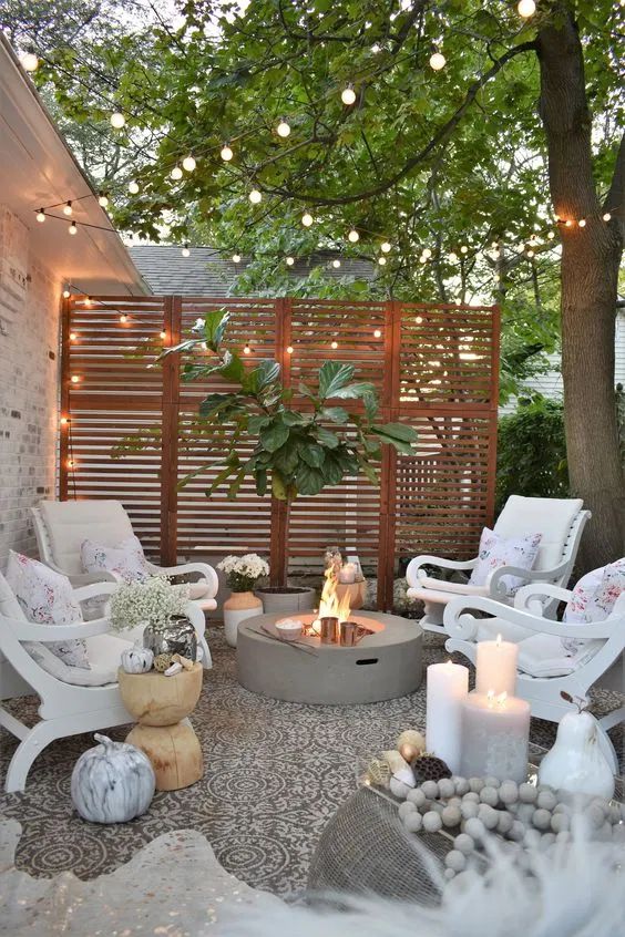 Small gourmet backyard with fairy lights