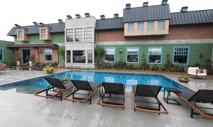 Sun loungers next to the pool.