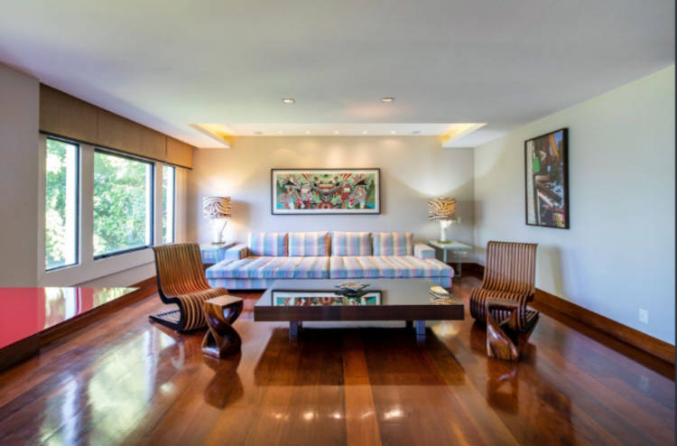 living room with striped sofa.