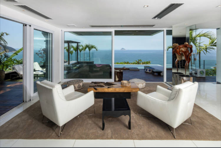 balcony overlooking the ocean.