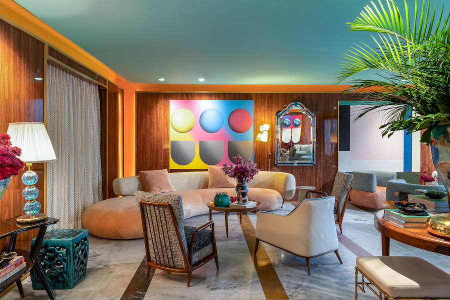 Living room with wooden walls at CASACOR SP.