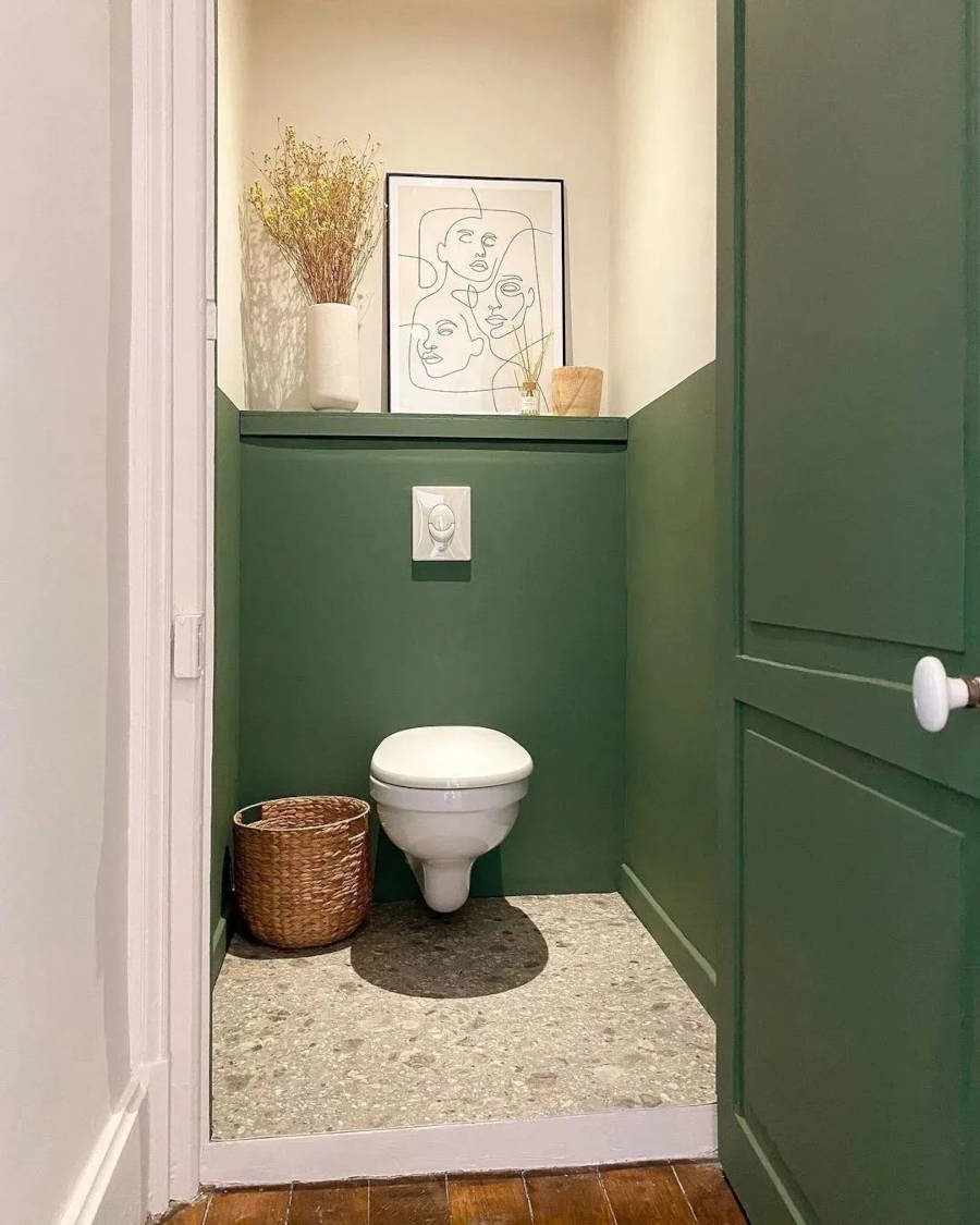 Bathroom with green walls.