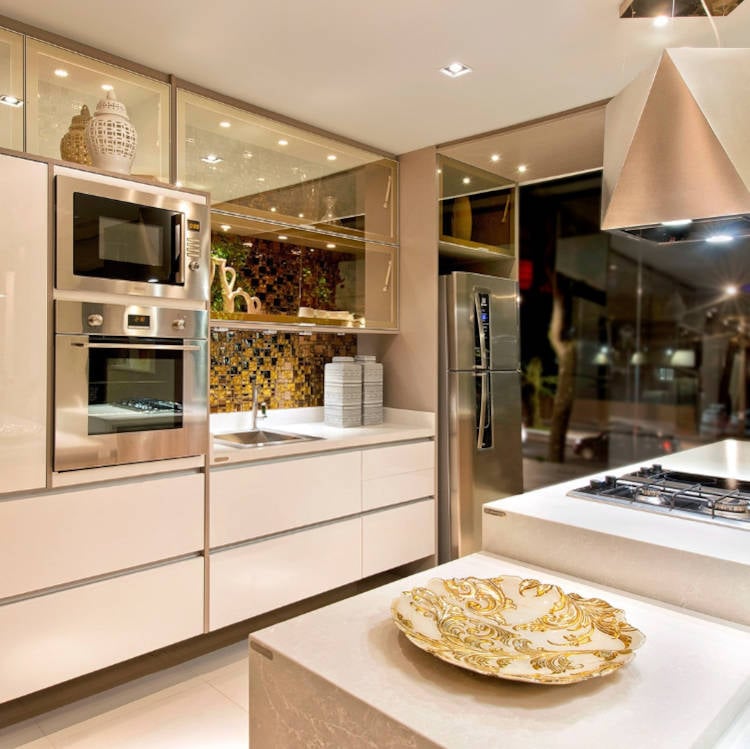 Kitchen cabinet designed for a medium kitchen. White and mirrored custom kitchen cabinet.