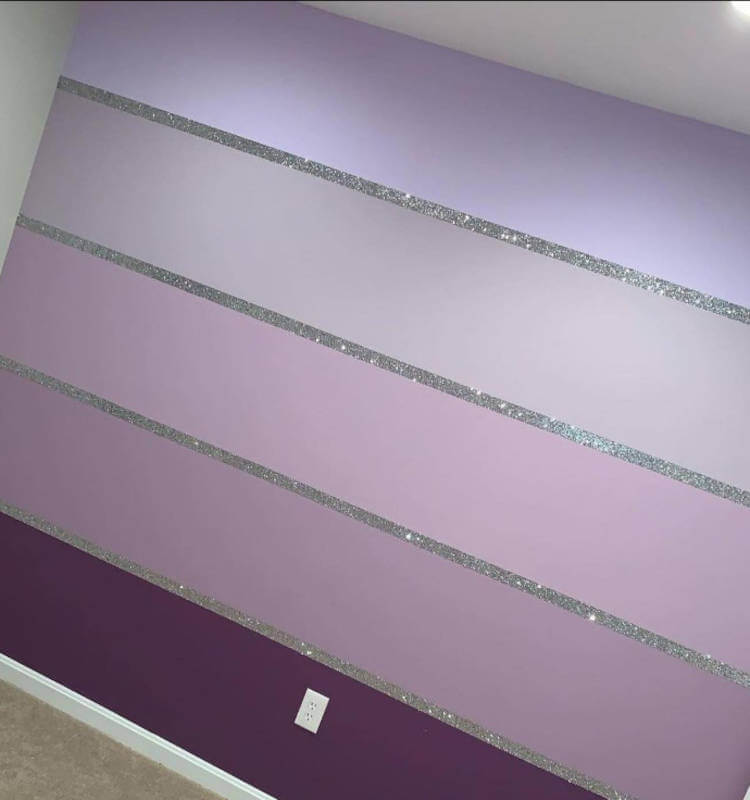 Wall with purple stripes.