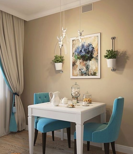 Blue chairs and white table.