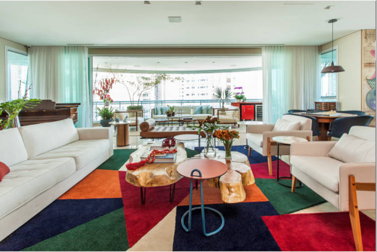 Living room with colorful rug.