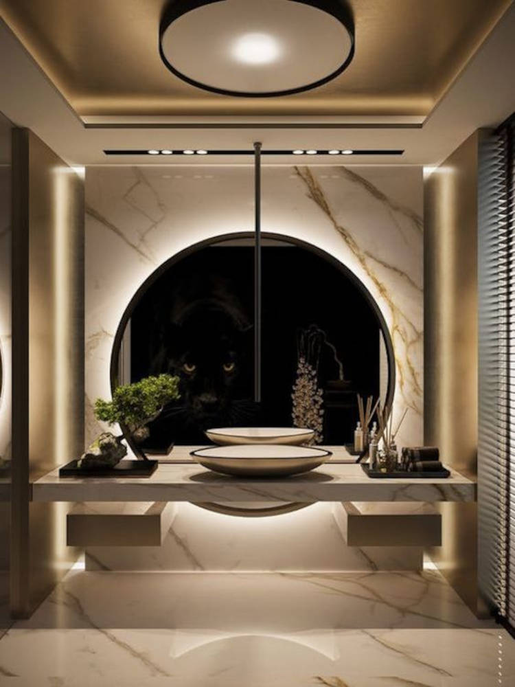 Bathroom with round mirror. 