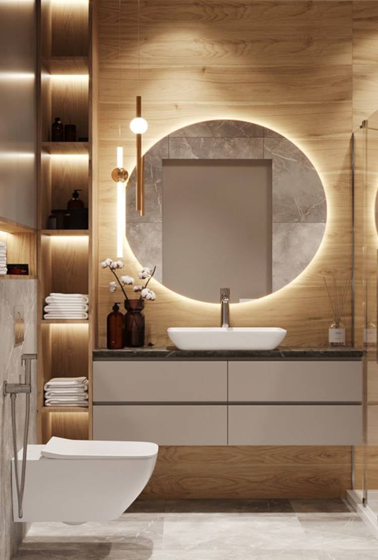 Rounded bathroom mirror.