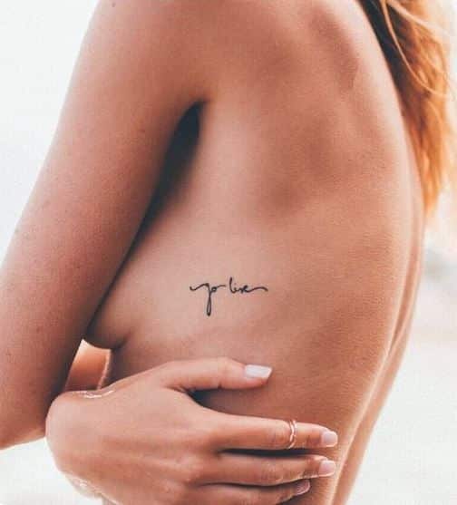 Female rib tattoo