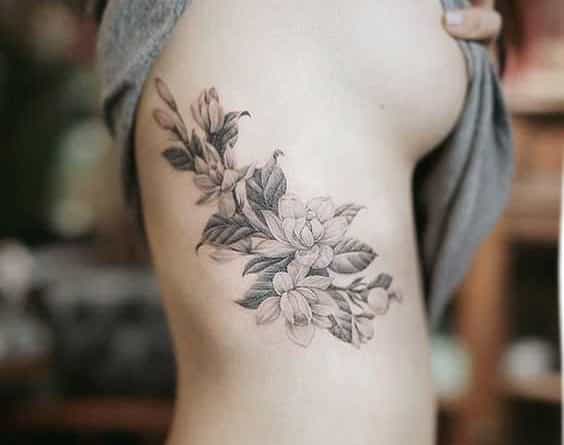 Female rib tattoo