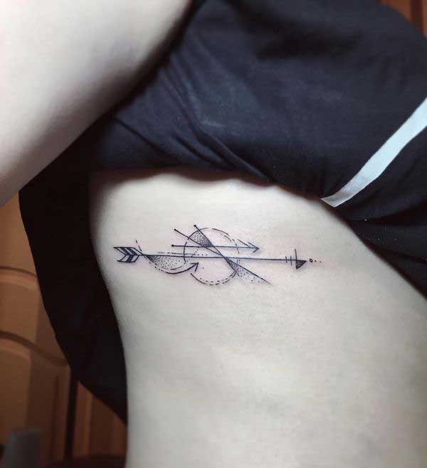 Female rib tattoo