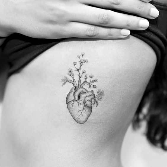 Female rib tattoo