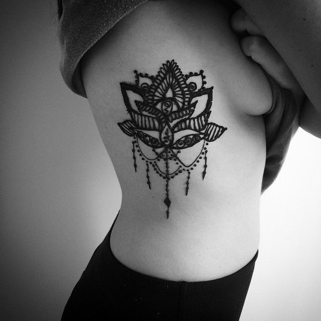 Female rib tattoo