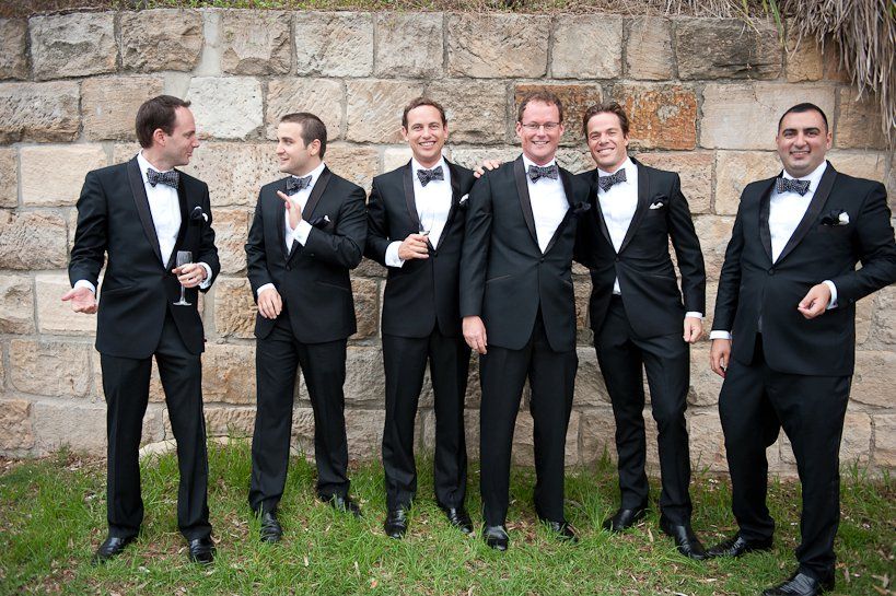 photo of the groom with the groomsmen for the wedding album
