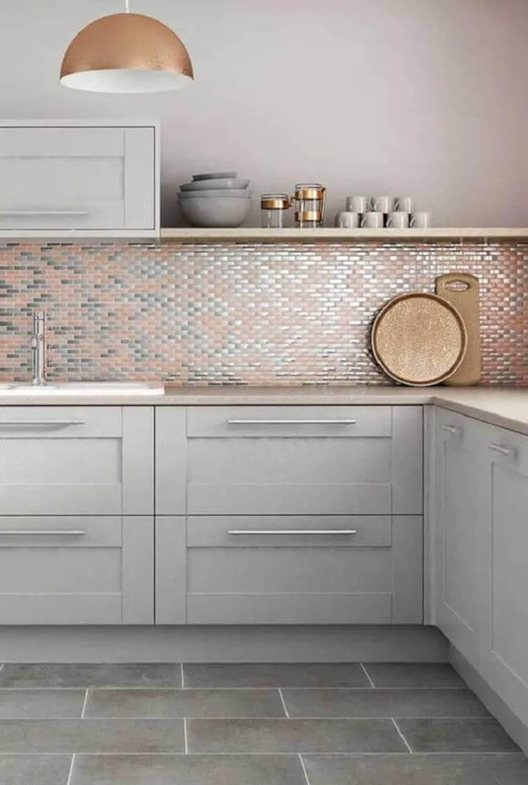 Kitchen with rose gold wall.