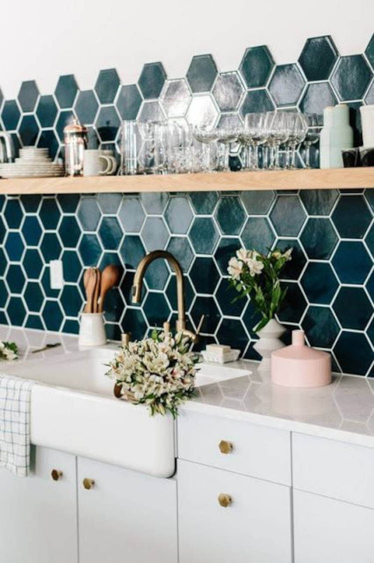 Kitchen with dark green tablets.