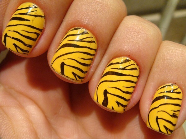 Photo of Yellow and Black Zebra Decorated Nails