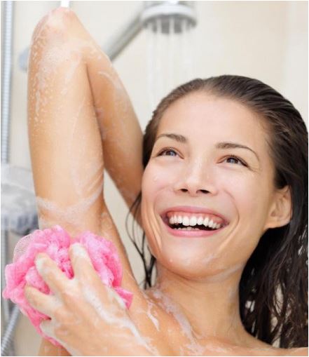 woman washing her armpits