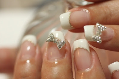 nails decorated with bow