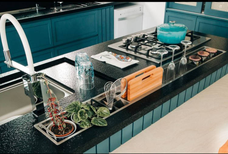 Space for plants and spices on the counter.