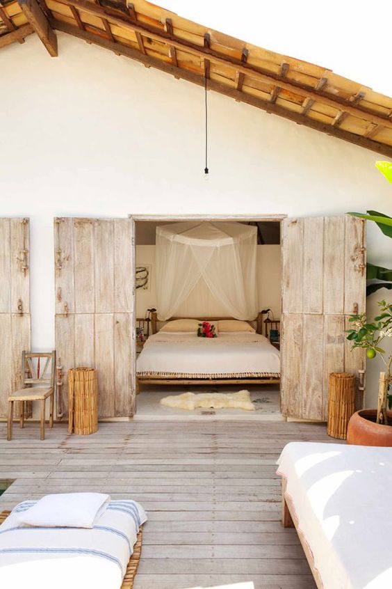 Beachy decor in the room with balcony.