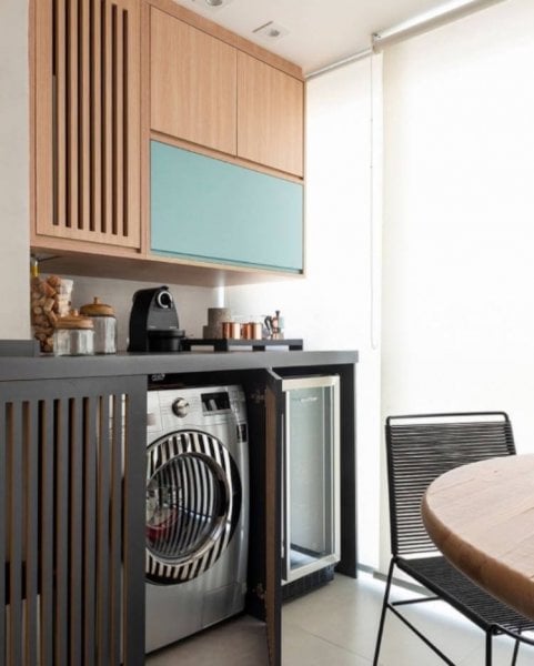 Balcony with laundry room and cellar.